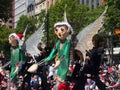 Fairy tale and fantasy floats ` Green angel with wings ` perform in the 2018 Credit Union Christmas Pageant parade.